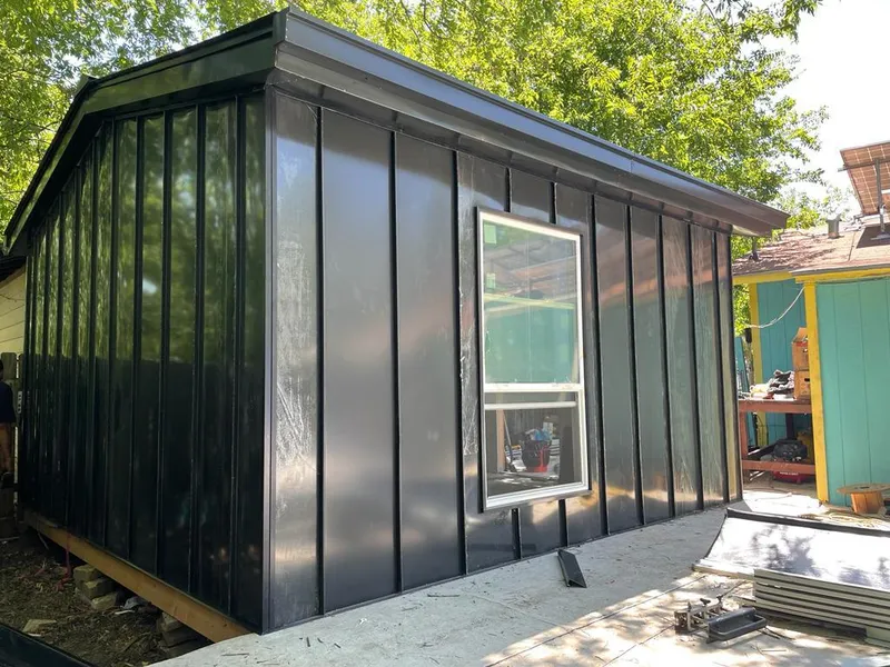 Black standing seam metal wall panels for Roof Inspection in Nantucket