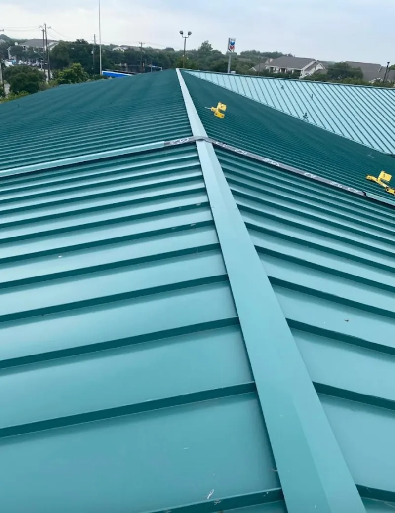 Green commercial metal roof ridge and valley for Metal Roof Repair in Nantucket